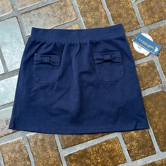 NWT U.S. Polo Assn. Navy Bow Pocket Scooter Skort - Picture 1 of 13